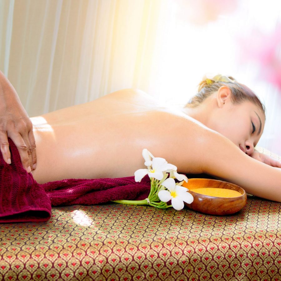 Beautiful Asian woman receiving massage in spa salon,Healthy lif Beautiful Asian woman receiving massage in spa salon,Healthy lifestyle